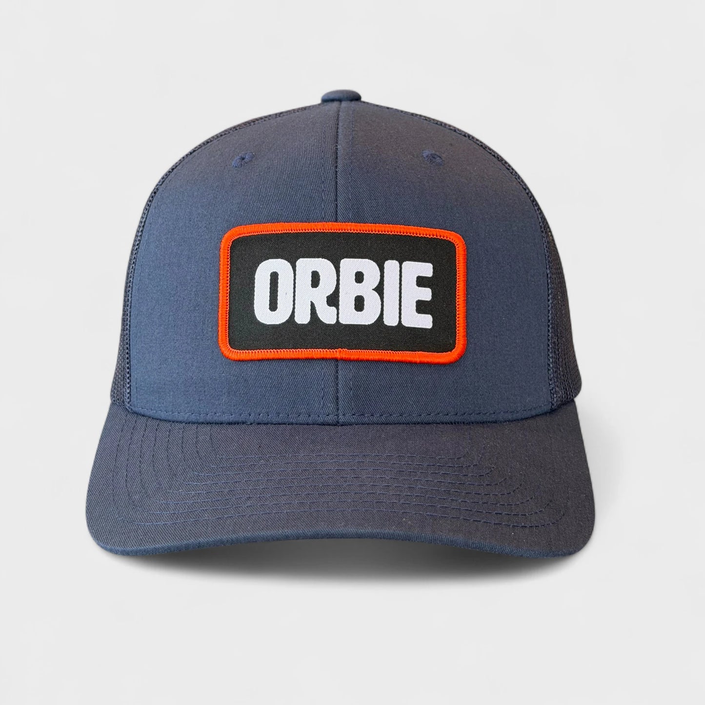 Orbie Badge Logo Trucker Hat - Navy