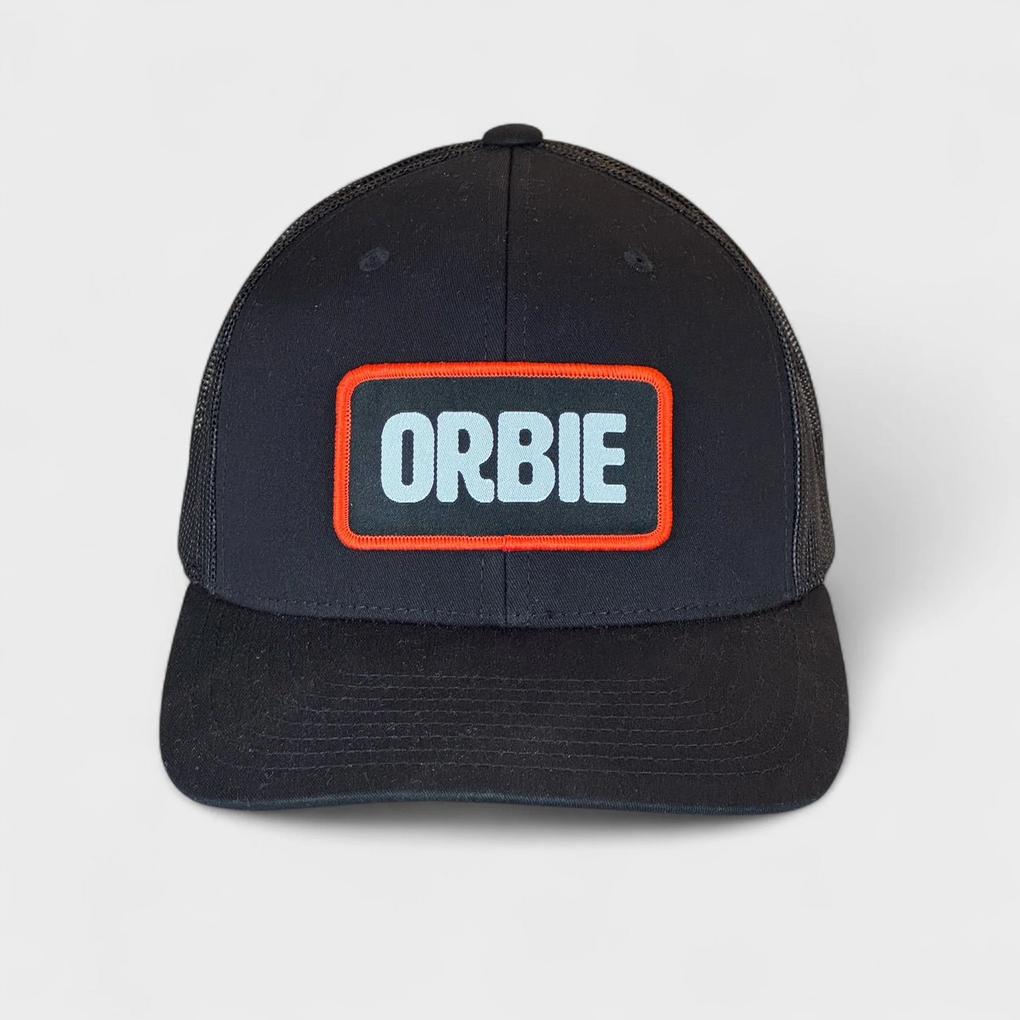 Orbie Badge Logo Trucker Hat - Black